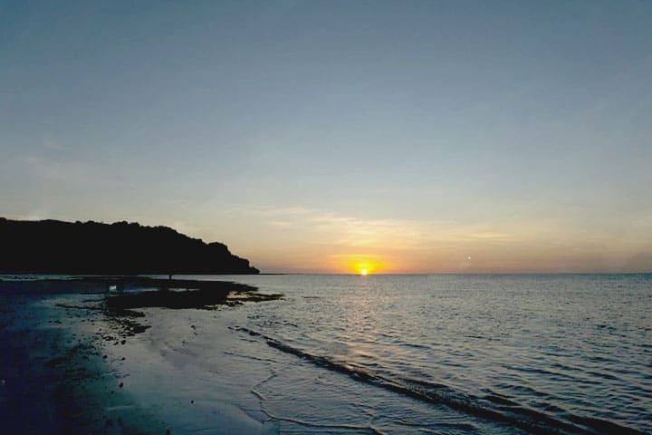 Watch the sunset on the beach